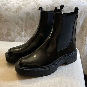 Chelsea lugged sole boots. Black patent leather boots
